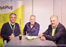 Georgo Detiger of Hemelraad & Keijzer Insurance, left, and Jan van Dijk of Holland Heater visited with Richard Scheffers of OptiPlug.